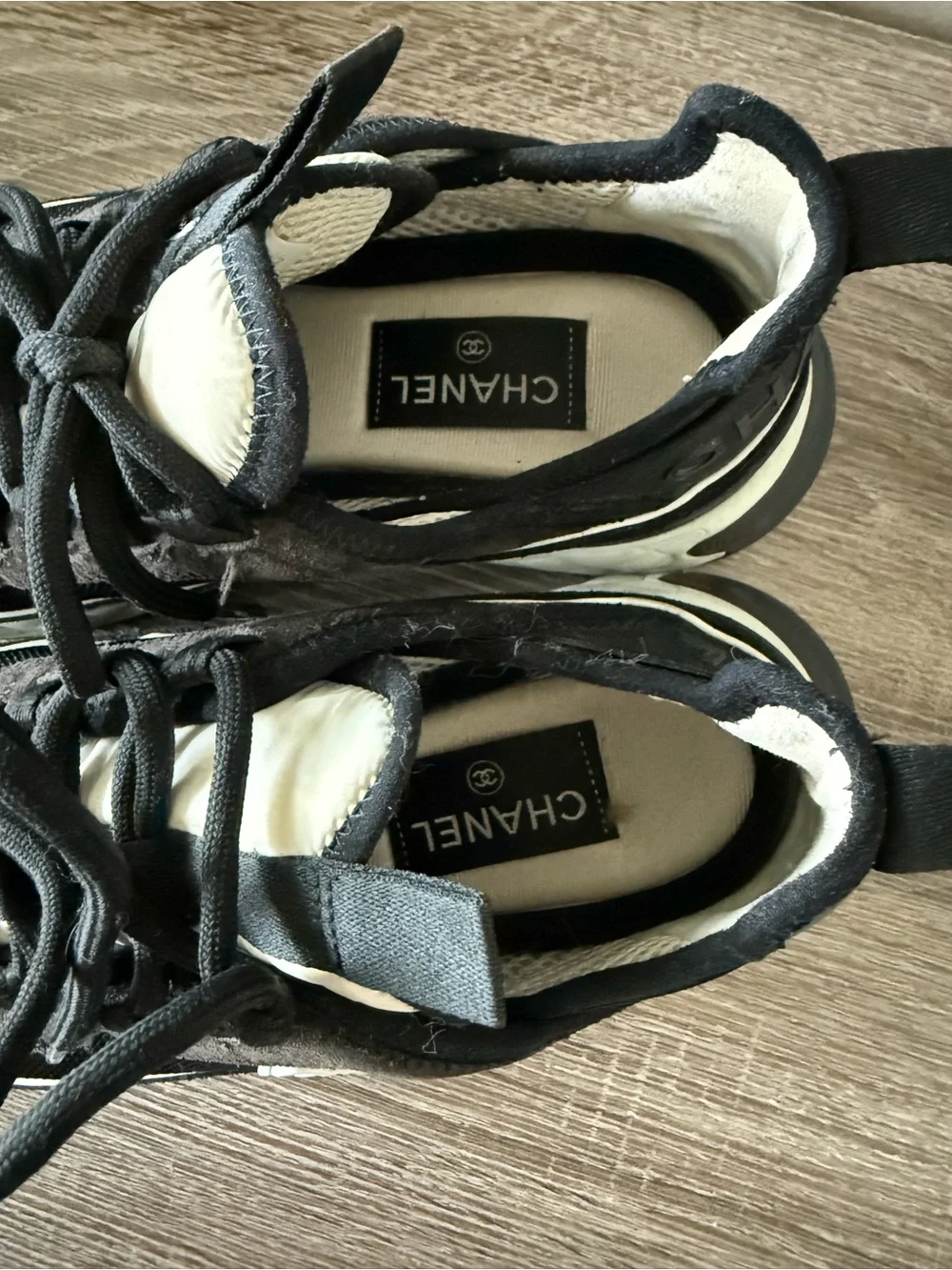 CHANEL Black and White Interlocking CC Runner Sneakers